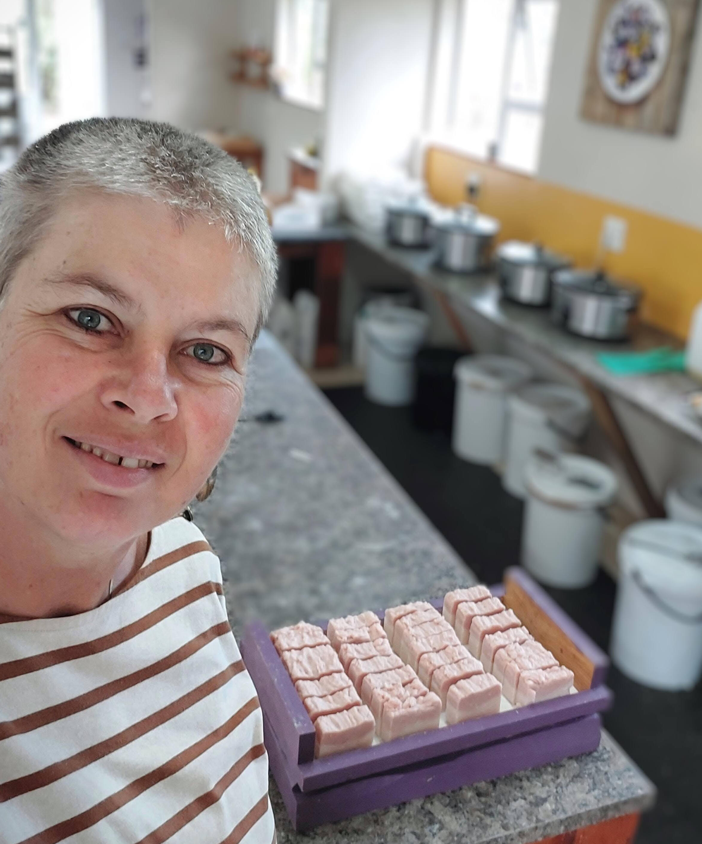 orange blossom handmade soap sitting on a cozy bathroom counter